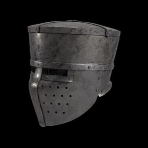 May include: A weathered, steel-colored medieval helmet with a flat top and riveted construction. The helmet features a visor with small ventilation holes and a horizontal eye slit. A band encircles the helmet, adding to its historical aesthetic.