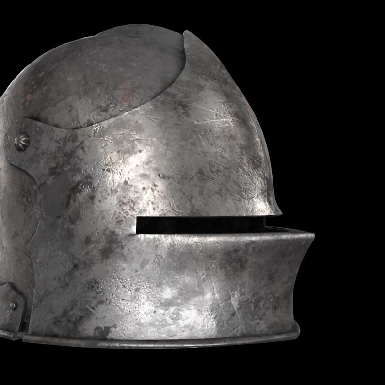 May include: A weathered, metallic helmet with a visor and a pointed top. The helmet has a horizontal slit for vision and is set against a black background. The metal shows signs of wear and tear, suggesting age or use.