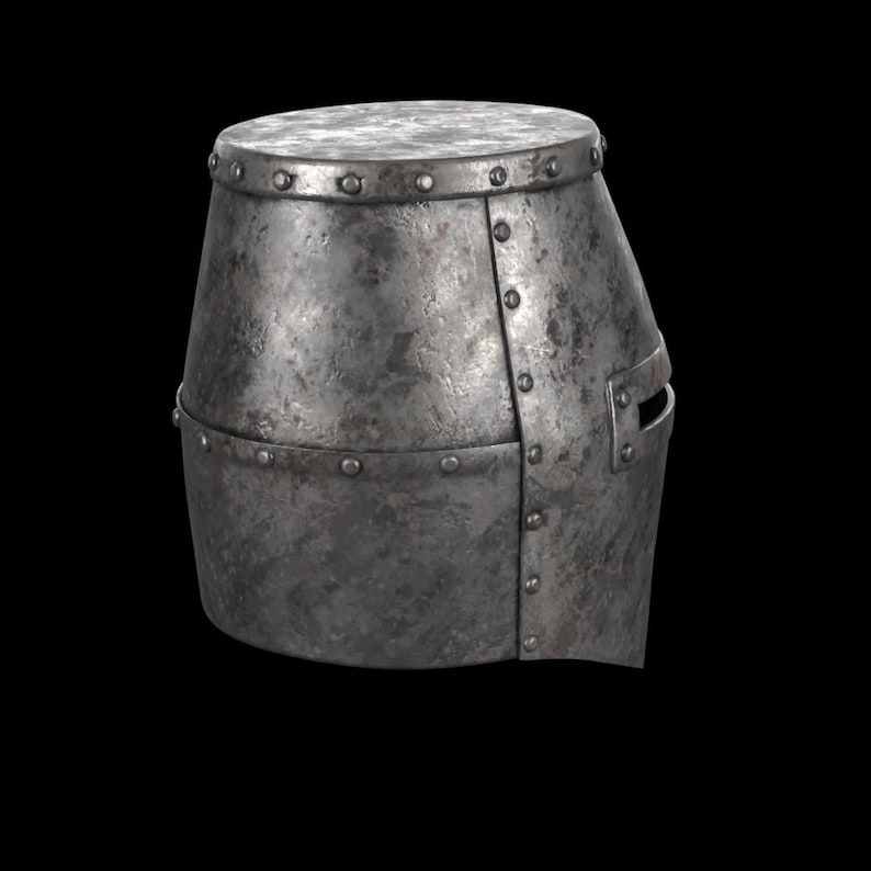 May include: A weathered, metallic helmet with a cylindrical top and a flared, riveted body. The helmet features a small eye slit and is likely part of a medieval or historical costume.