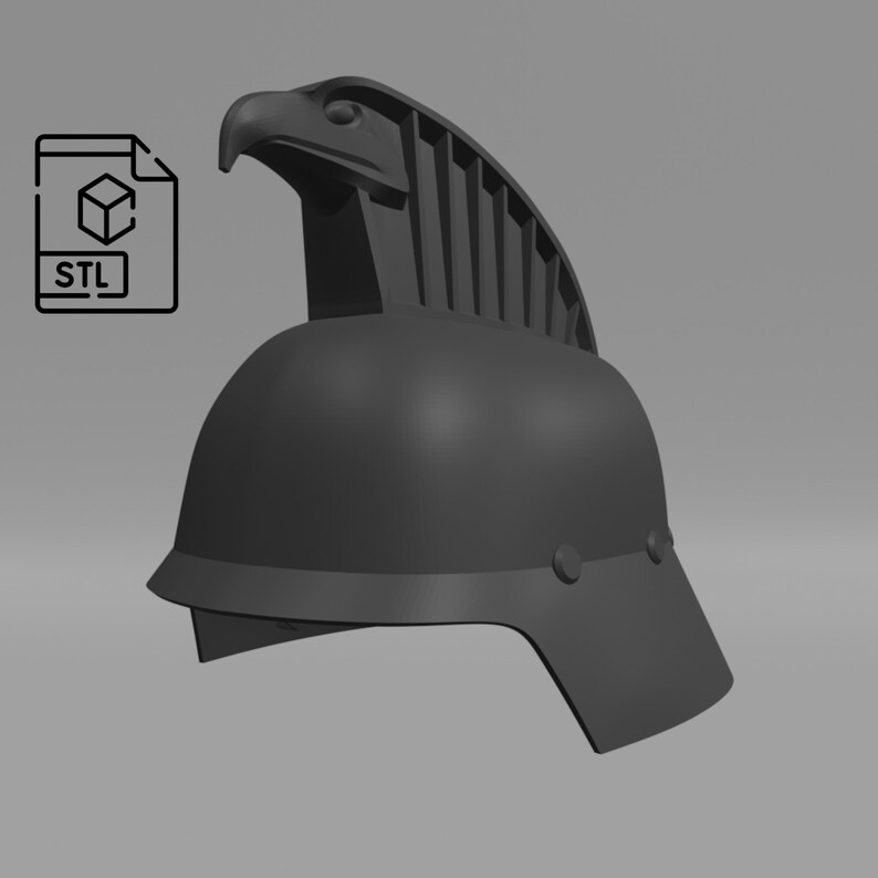 Puede incluir: Un modelo impreso en 3D de un casco con una cresta de &aacute;guila. El casco es gris y el &aacute;guila est&aacute; detallada con un pico, ojos y plumas.