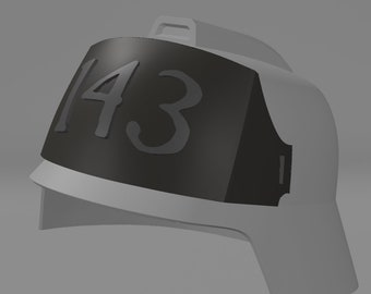 May include: A white firefighter helmet with a black visor and the number "143" printed on the front.