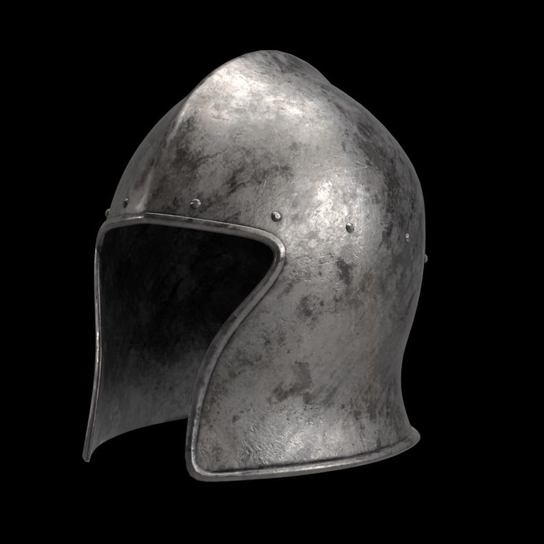 May include: A medieval-style helmet with a weathered, metallic appearance. The helmet features a rounded top and a face opening with a curved design. Rivets are visible along the edges, and the overall texture suggests age and use. The background is black.