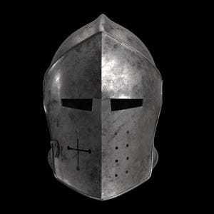 May include: A weathered, metallic knight's helmet with a cross emblem on the front. The helmet features eye slits and ventilation holes, showcasing a medieval design. The helmet's surface has a worn, textured appearance, suggesting age and use.