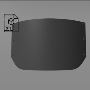 May include: A black, curved, metal shield with rounded edges and multiple small rivets along the perimeter.