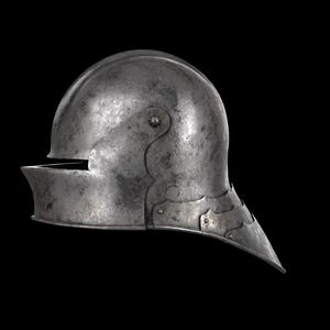 May include: A steel helmet with a rounded top and a visor. The helmet has a pointed lower edge and is riveted together. The metal has a slightly weathered appearance, suggesting age or use. The helmet is set against a black background.