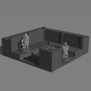 May include: A miniature diorama set with two figures standing in a wooden structure. The structure has a wooden floor and walls, and a small dirt mound in the center. The figures are wearing military uniforms and holding weapons.