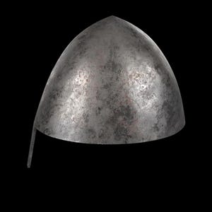 May include: A weathered, metallic helmet with a rounded top and a pointed apex. The helmet has a slightly curved brim and a distressed, textured surface, suggesting age and use. The color is a muted gray with darker patches.