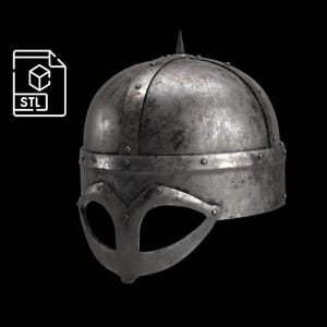 May include: A weathered, metallic Viking helmet with a prominent eye guard and a spiked top. The helmet is riveted and shows signs of wear, suggesting a battle-worn aesthetic. The image includes an STL file icon.