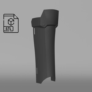May include: A 3D printable model of a black leg armor piece. The armor is designed with a segmented look and has a rounded bottom.