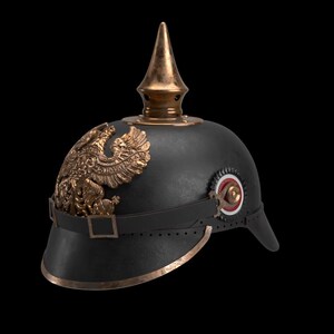 May include: Black Prussian Pickelhaube helmet with a brass spike and decorative eagle emblem. The helmet features a leather chin strap and a circular emblem with red and white accents. The trim is a brass color.