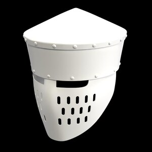 May include: A white, medieval-style helmet with a pointed top and a face guard featuring multiple rectangular ventilation holes. The helmet has a cylindrical midsection with rivets and a curved lower section.