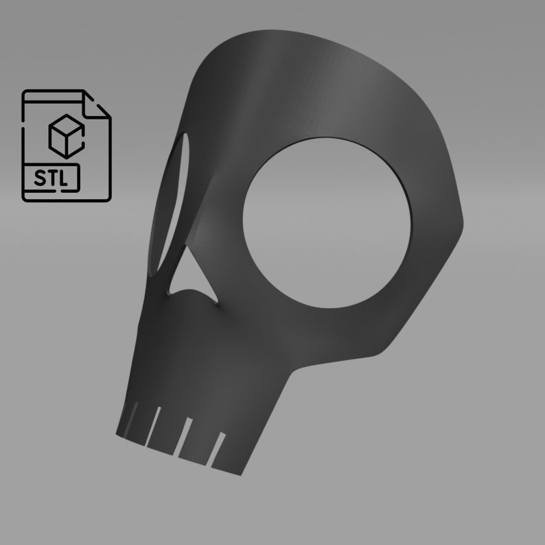 K&ouml;nnte beinhalten: Eine schwarze Totenkopfmaske mit einem gro&szlig;en Augenloch und einem kleineren Mundloch. Die Maske besteht aus einem glatten, matten Material und hat eine leicht strukturierte Oberfl&auml;che.