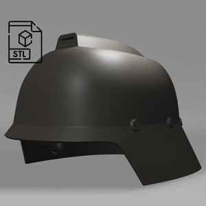 May include: A black plastic helmet with a visor and a small ridge on the top. The helmet has two small black dots on the side.