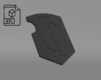May include: A 3D printed shield with a stylized letter C in the center. The shield is gray and has a slightly rough texture.