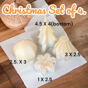 12.99 dls Set of 4 Christmas Candles. Greimie Candle Co. 3D Soy & Beeswax Wax Decorative Pillar Candles. Sizes shown in inches. Color: Ivory