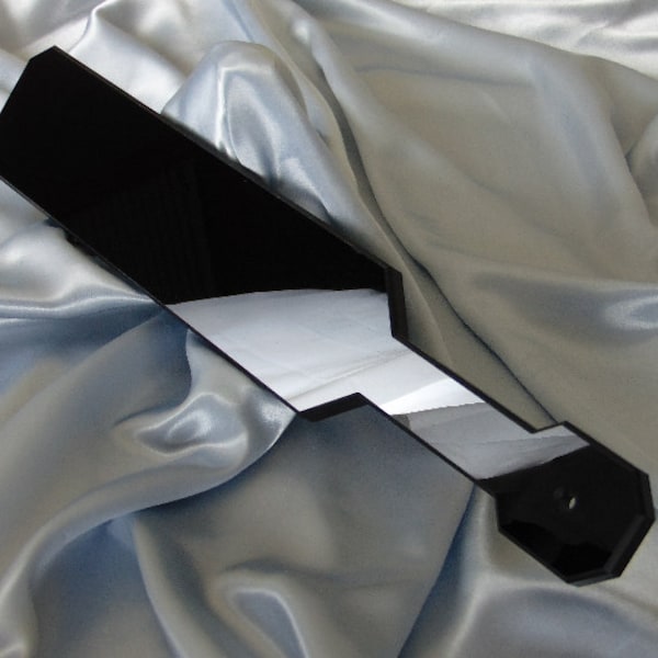 Paleta de obsidiana para azotes