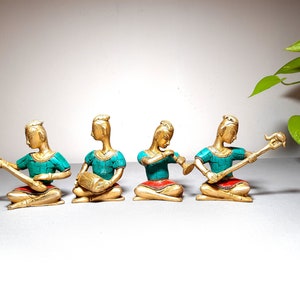 Brass Statue of four musicians with Coral stone work