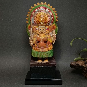Original Antique Indian wooden Theyyam figure from part of temple architecture from kerala with veg dye hues.