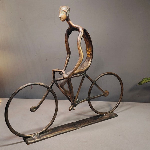 Antique Brass Man Riding a Bicycle Sculpture. Perfect for your Interior Decor