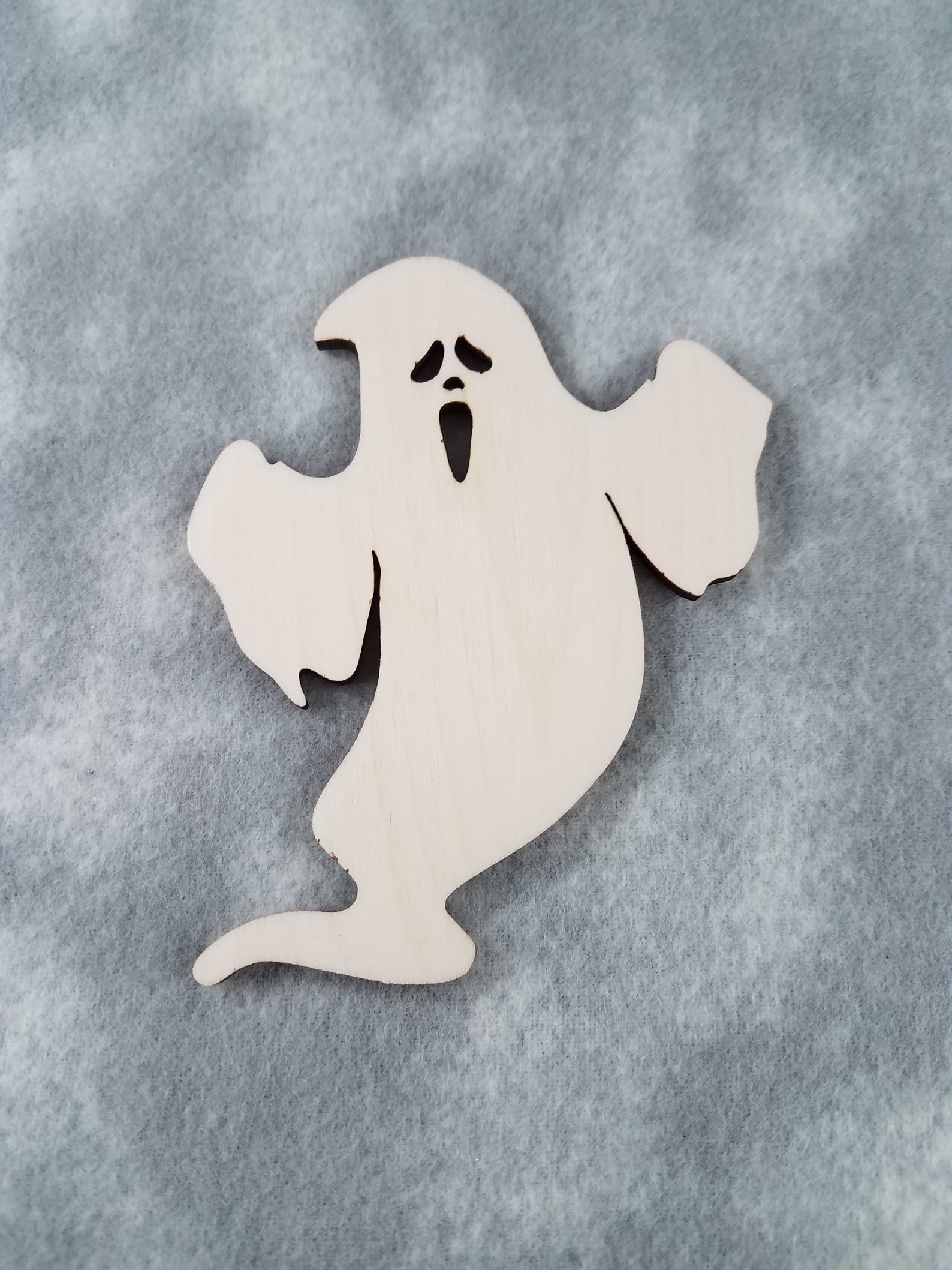 5.Whispers From The Beyond: Ghost Wood Cutouts