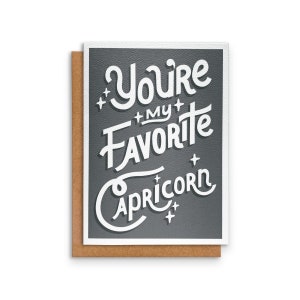 May include: A grey card with white text that reads "You're my favourite Capricorn".