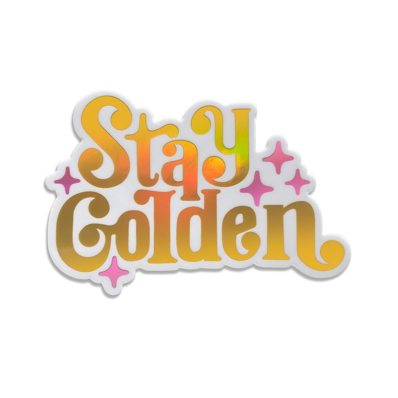 May include: A white sticker with a gold foil design that says "Stay Golden" with pink stars around the text.
