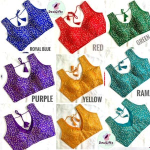 May include: A set of nine embroidered blouses in various colors, including royal blue, red, green, purple, yellow, and teal. Each blouse has a floral pattern and a tassel tie.