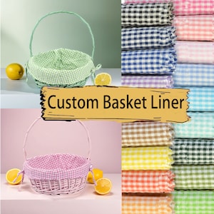 May include: Two wicker baskets with handles, one green and one pink, each with a gingham patterned fabric liner. The liners are available in a variety of colors, including black, white, blue, green, yellow, orange, and brown.  Custom Basket Liner.