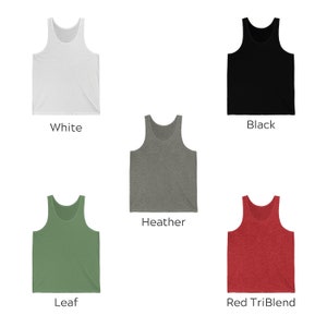 May include: Five tank tops in different colors: white, black, heather gray, green, and red. The tank tops are all the same style, with a scoop neck and a relaxed fit.