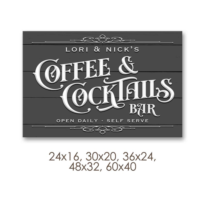May include: A rectangular sign with the text "LORI & NICK'S COFFEE & COCKTAILS BAR" in white, stylized lettering. The sign is dark gray with horizontal wood grain. The text "OPEN DAILY - SELF SERVE" is at the bottom. Sizes available: 24x16, 30x20, 36x24, 48x32, 60x40 inches.