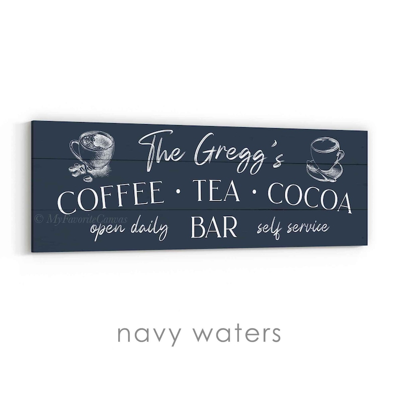 May include: Navy blue wooden sign with white text that reads "The Gregg's COFFEE &bull; TEA &bull; COCOA" with coffee and tea cup illustrations. The sign also says "open daily BAR self service".