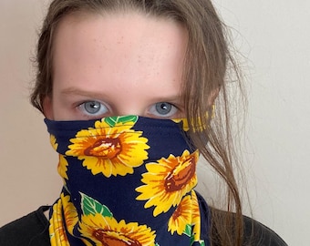 May include: A blue face mask with a sunflower pattern. The mask is made of a soft, comfortable fabric and is ideal for everyday use.