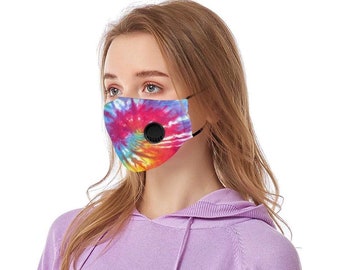May include: A tie-dye face mask with a black valve. The mask is made of a soft, breathable fabric and has adjustable ear loops.