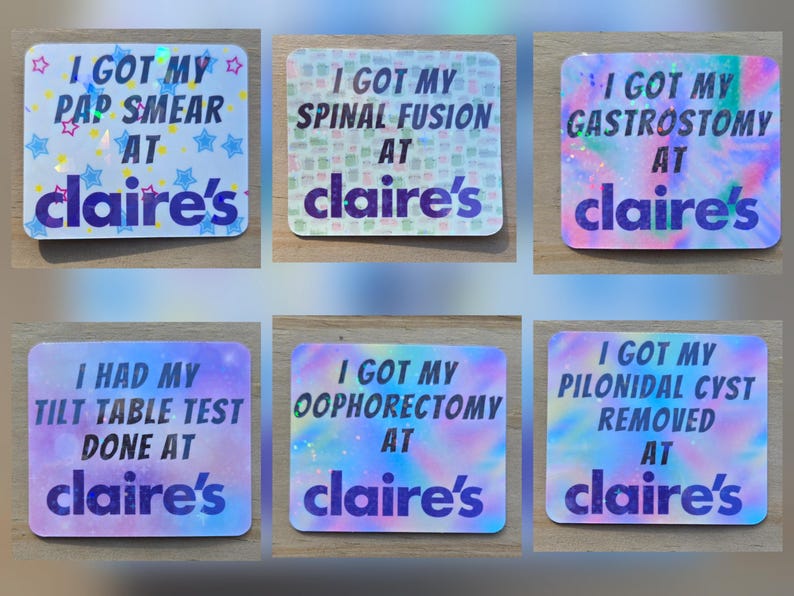May include: A collection of six rectangular stickers with holographic backgrounds and text. Each sticker has a different phrase, such as "I GOT MY PAP SMEAR AT claire's". The stickers have a colorful, glittery design.