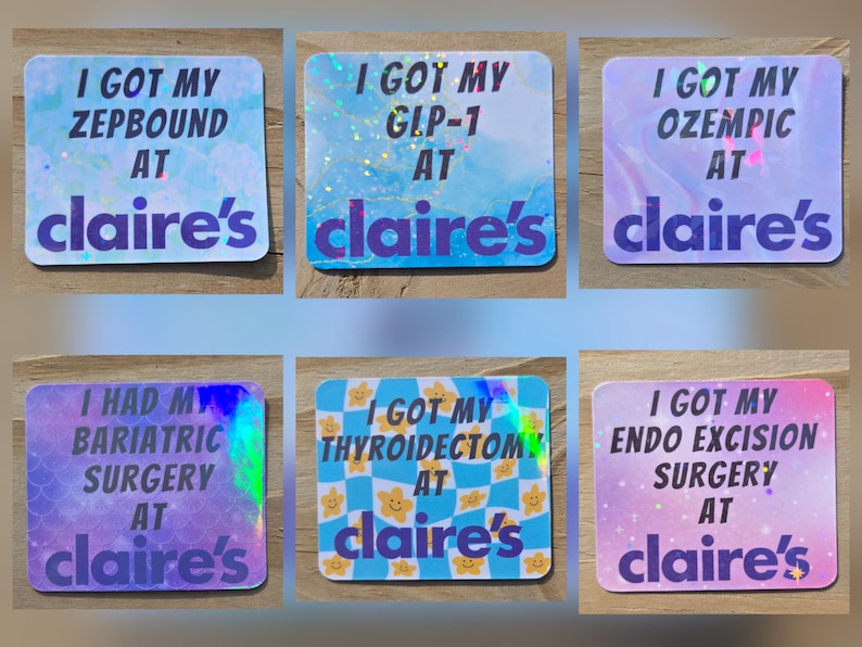 May include: A collection of six square stickers with holographic and pastel backgrounds. Each sticker has the phrase "I GOT MY" followed by a medical term and "AT claire's". The stickers are in shades of blue, purple, and pink.