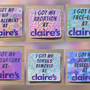 May include: Six colorful stickers with the text "I GOT MY" followed by different procedures, all "AT claire's". The stickers have floral, leopard, and scale patterns in various colors, including pink, purple, and blue.