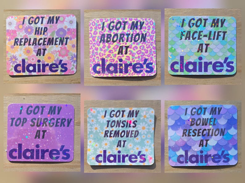 May include: Six colorful stickers with the text "I GOT MY" followed by different procedures, all "AT claire's". The stickers have floral, leopard, and scale patterns in various colors, including pink, purple, and blue.