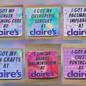 May include: A collection of six rectangular stickers with holographic and pastel backgrounds. Each sticker features the phrase "I GOT MY" followed by a medical procedure and "AT claire's" in a playful font. The stickers are in various colors.