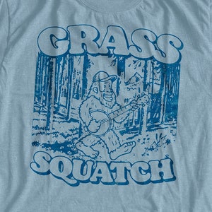 GrassSquatch! Sasquatch Banjo Bigfoot In The Forest Vintage Bluegrass UNISEX T-Shirt