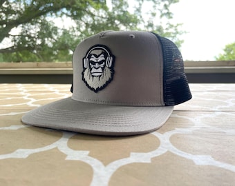 Giant Step Design Co  Embroidered Bigfoot Sasquatch Headphones Patch Retro Mesh Trucker Hat - Black/Grey