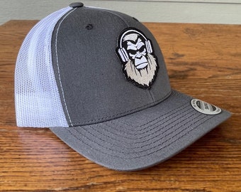 Sasquatch With Headphones Embroidered Patch Structured Trucker Hat - Dark Grey / White Yupoong Classic Structured Cap