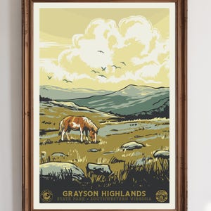 May include: A framed vintage-style poster featuring a landscape scene from Grayson Highlands State Park in Southwestern Virginia. The artwork depicts a horse grazing in a field, mountains, clouds, and birds. The poster has a brown wooden frame.