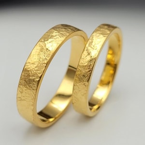 Hamrade vigselringar, guldpläterade matchande ringar, hans och hennes armband, sterlingsilver