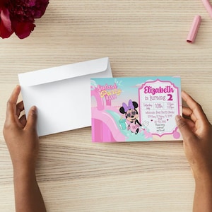 May include: A pink and blue invitation card featuring a cartoon character of Minnie Mouse wearing sunglasses and a pink swimsuit. The text on the card reads "Splash Party Bash" and "Elizabeth is turning 2".