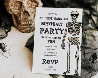 May include: A Halloween-themed birthday party invitation with a skeleton wearing sunglasses. The invitation reads "ONE HUGE HAUNTED BIRTHDAY PARTY" and includes event details. A gold skull and black spiders decorate the scene.
