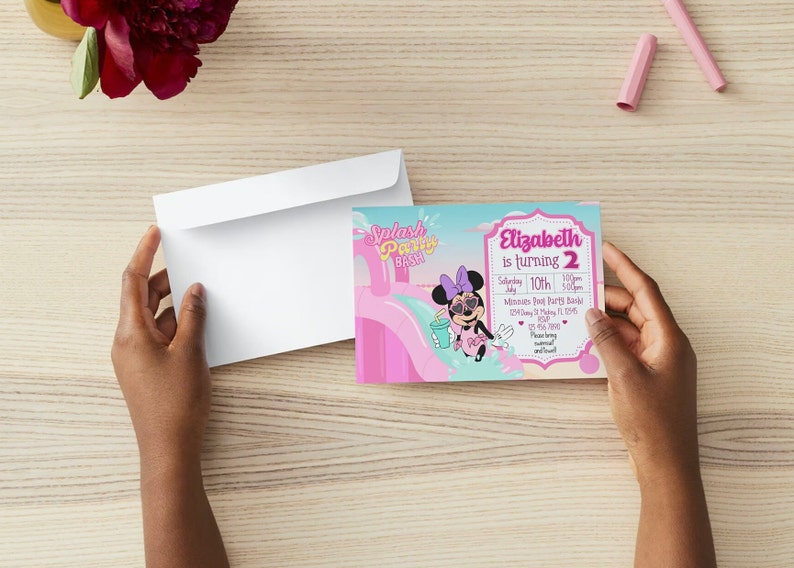 May include: A pink and blue birthday invitation featuring a cartoon image of Minnie Mouse on a water slide. The text on the invitation reads "Splash Party Bash" and "Elizabeth is turning 2".