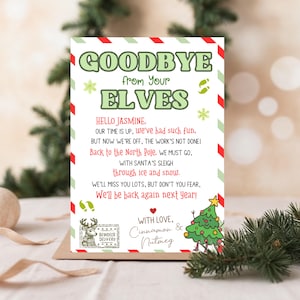 May include: A Christmas card with a green and red striped border. The card says "Goodbye from your Elves" and has a message from the elves to Jasmine. The card also has a picture of a Christmas tree and a reindeer.