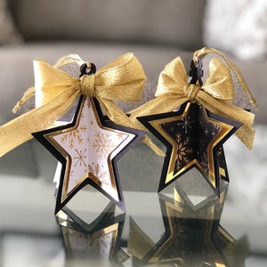 3D-kerstster ornament SVG. Gebruik deze eenvoudig te maken ornamentsjabloon en vul je kerst met fonkelende, fonkelende kleine sterren. Klik!