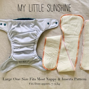 May include: A white cloth diaper with teal trim and a set of three beige cloth inserts with orange stitching. The diaper is labeled "My Little Sunshine" and "Large One Size Fits Most Nappy & Inserts Pattern" and "Fits from approx. 7-24 kg".