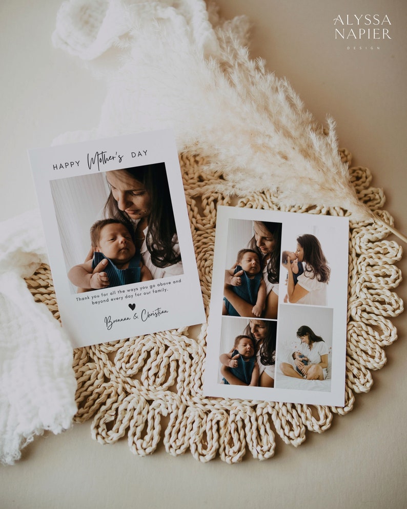 May include: Two white Mother's Day cards with photos of a mother and baby. One card reads "Happy Mother's Day" and includes a message from Brennan & Christian. The cards are on a beige woven placemat with decorative elements.